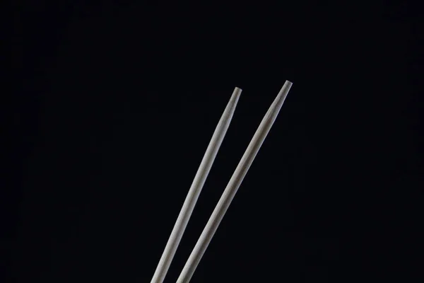 Chopsticks Fundo Preto — Fotografia de Stock