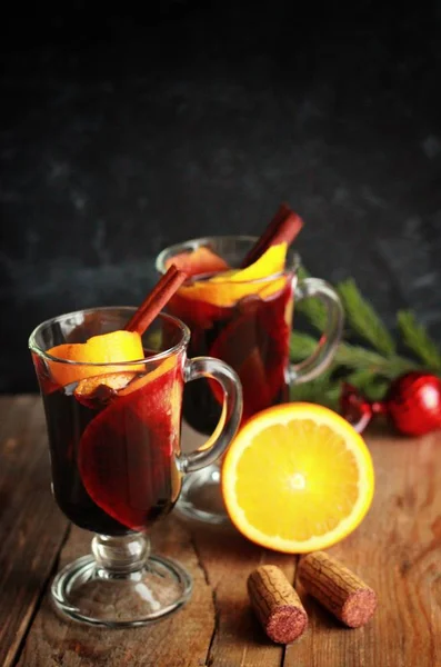 Two Glass Cups Mulled Wine Orange Cinnamon Wooden Table Dark — Stock Photo, Image