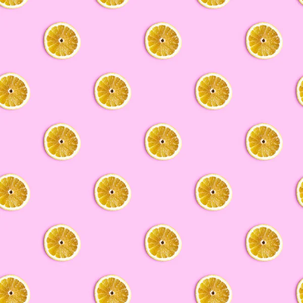 Kusursuz desen. Pembe arka planda limon dilimleri.
