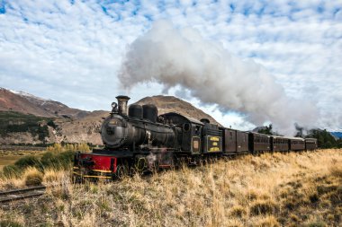 Esquel, Argentina - April 28, 2018: Viejo Expreso Patagonico, in English known as the Old Patagonian Express, is a 750 mm (2 ft 5 12 in) narrow gauge railway in Patagonia, Argentina using steam locomotives clipart