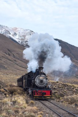 Esquel, Argentina - April 28, 2018: Viejo Expreso Patagonico, in English known as the Old Patagonian Express, is a 750 mm (2 ft 5 12 in) narrow gauge railway in Patagonia, Argentina using steam locomotives clipart