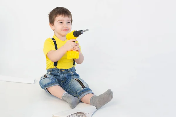 Small Boy Builder Suit Makes Repairs White Background — Stock Photo, Image
