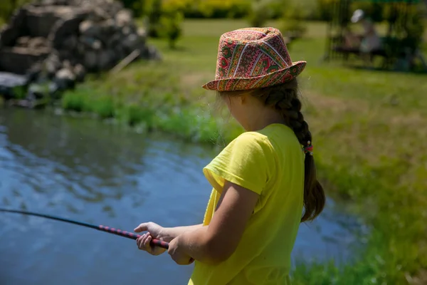 Little girl fishing Stock Photos, Royalty Free Little girl fishing