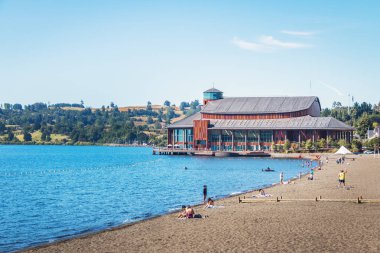 Frutillar, Chile - Feb 24, 2018: Llanquihue Lake beach and Teatro del Lago (Lake Theatre) - Frutillar, Chile clipart