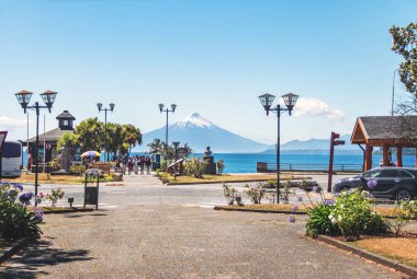 Puerto Varas, Chile - Feb 22, 2018: Plaza de Armas Square and Osorno Volcano - Puerto Varas, Chile clipart