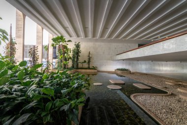 Brasilia, Brasil - Aug 29 2018: Garden at Entrance Hall of Itamaraty Palace interior - Brasilia, Distrito Federal, Brazil clipart