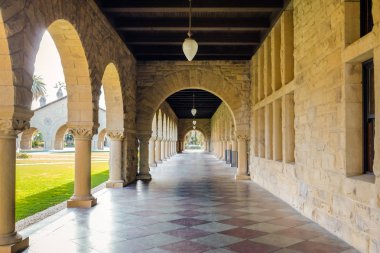 PALO ALTO, USA - January 11, 2017: Arches of Main Quad at Stanford University Campus - Palo Alto, California, USA clipart