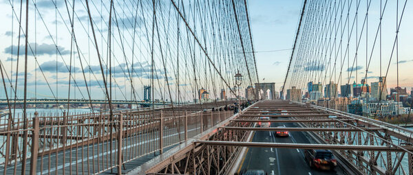 Panoramic View of Brooklyn Bridge traffic and Brooklyn skyline -