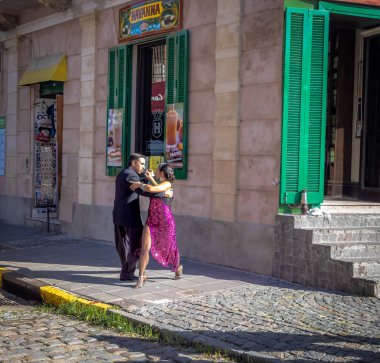 Buenos Aires, Argentina - May 12, 2018: Tango dancers at La Boca neighborhood - Buenos Aires, Argentina