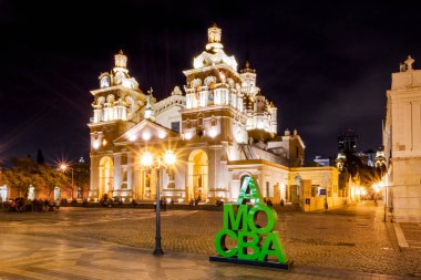 Cordoba, Argentina - May 7, 2018: Cordoba Cathedral and city sign at night - Cordoba, Argentina