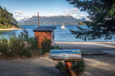 Villa La Angostura, Argentina - Feb 17, 2018: Villa La Angostura sign at Bahia Brava Bay at Nahuel Huapi Lake - Villa La Angostura, Patagonia, Argentina