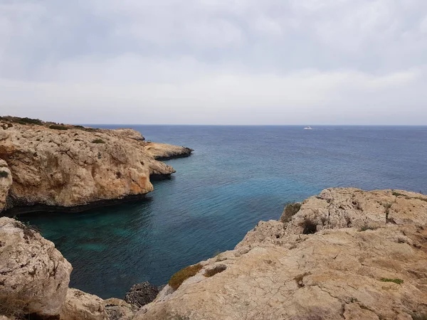 View to the sea, Cyprus, Protaras, May 2018. Beautiful blue sea.Rocks and mountains. It takes breath from this spectacle