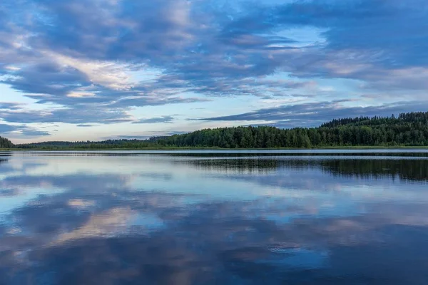 Fields, lakes of finland. Panoramic field landscape. Beautiful nature background.