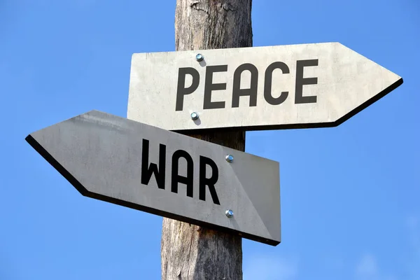 Peace War Signpost — Stock Photo, Image