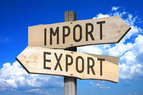 Import, export - wooden signpost