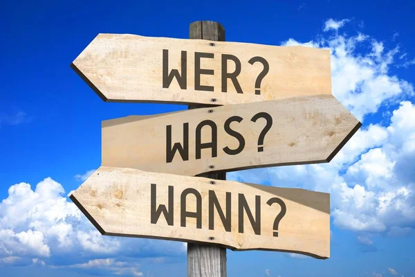 Questions in German - wooden signpost
