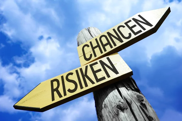 Risk, chance (German) - wooden signpost