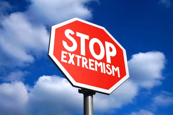 Stop extremism sign, sky in background.