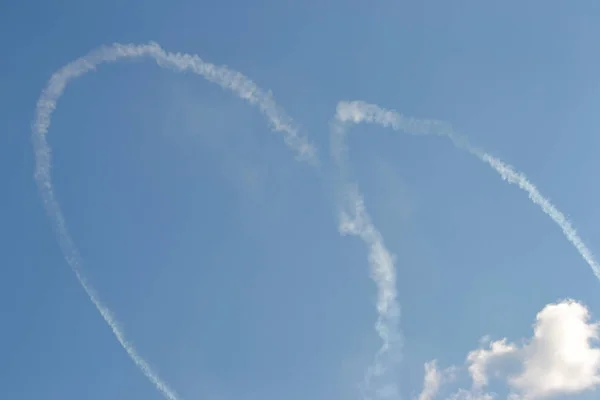 Heart shape - plane trail/ smoke