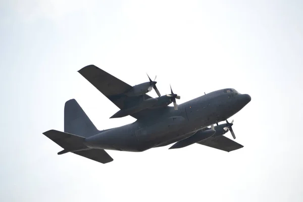 Military transportation plane flying in the air