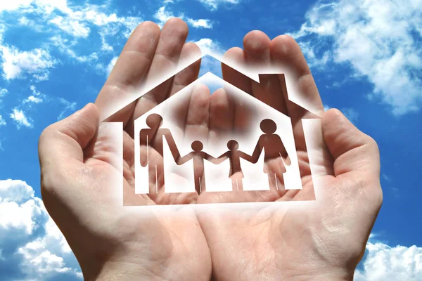 Family insurance concept, hands, sky in background