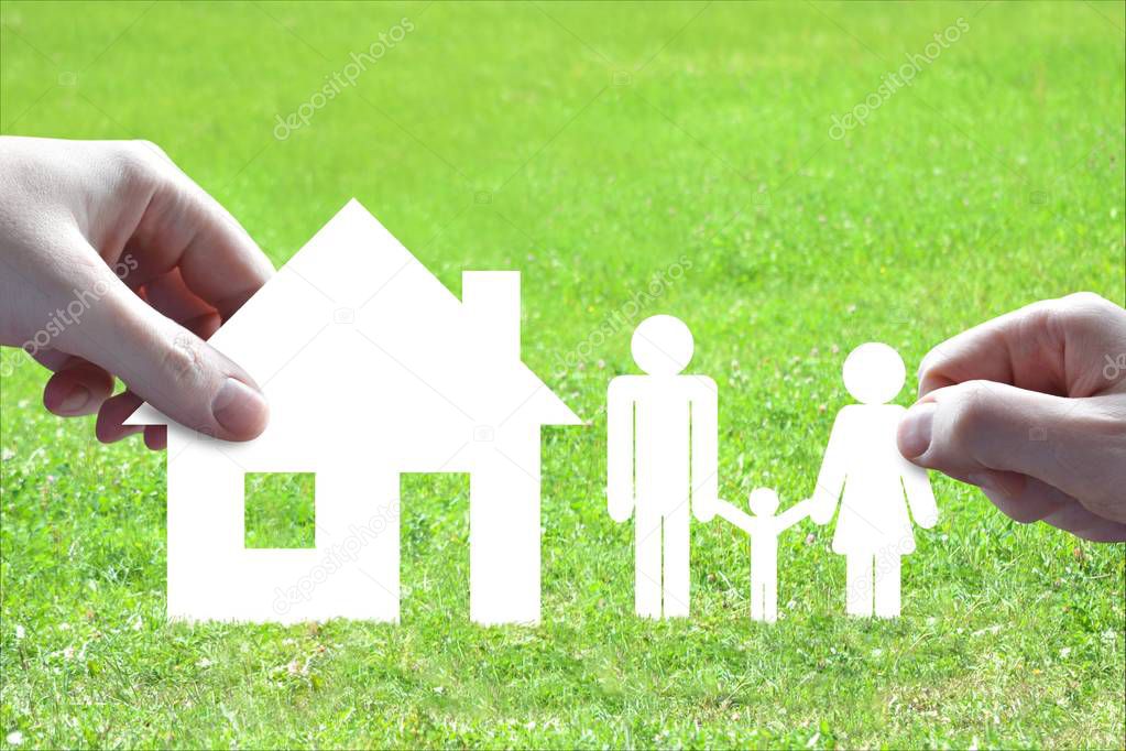 House, family concept, hand, grass in background