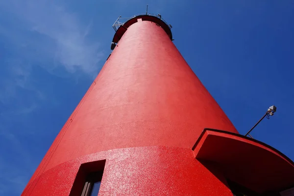 Red lighthouse - view from below — Stock Photo, Image