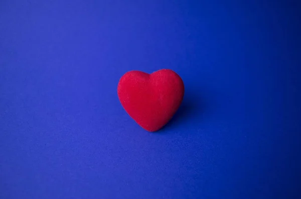 Heart on a blue background, there is free space to fill the text