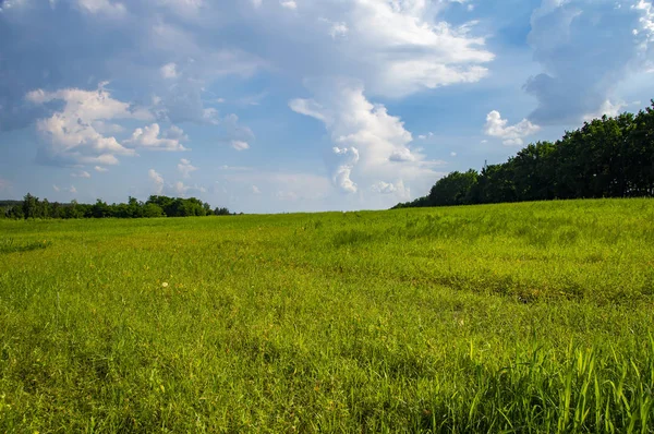 Natural landscape against the blue sky with clouds.