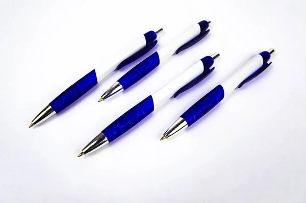 Ballpoint pen for writing on a white background.
