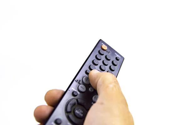 Remote tv remote in man\'s hand.