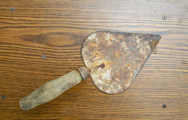 Old rusty trowel - builder\'s tool.