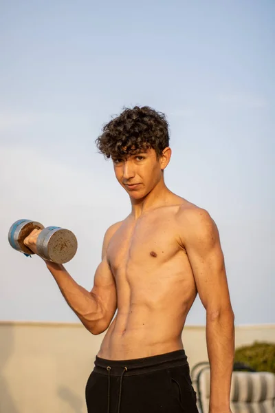 Young boy doing fitness — Stock Photo, Image