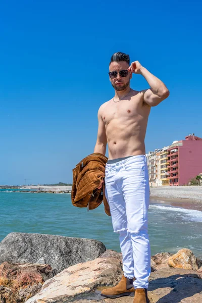 Young Man White Pants Modern Styling Posing Beach Mediterranean Sea — Stock Photo, Image