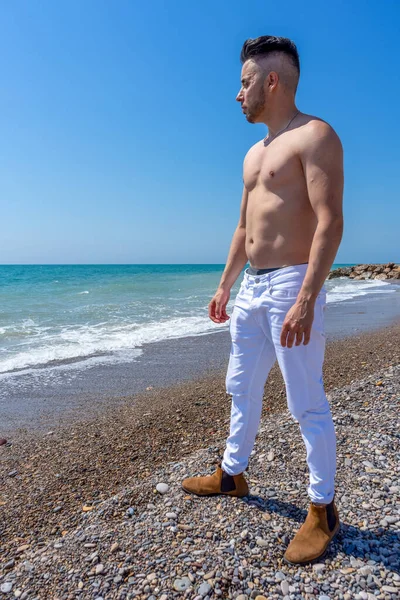 Young Man White Pants Modern Styling Posing Beach Mediterranean Sea — Stock Photo, Image