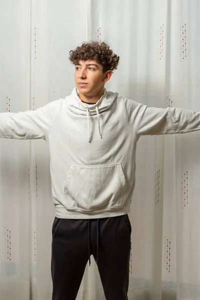 Attractive Young Man Curly Hair Wearing White Sweatshirt Posing White — Stock Photo, Image