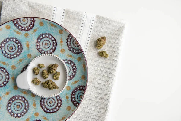 Top View Marijuana Buds Vintage Plate Atop Silver Placemat White — Stock Photo, Image