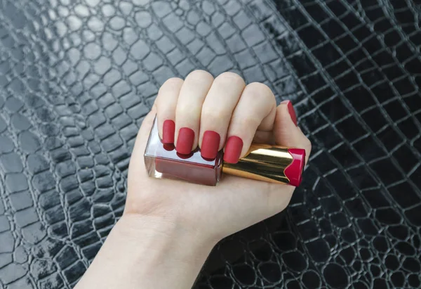Stylish fashionable female red matte manicure, square shape — Stock Photo, Image