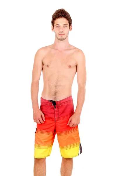白に隔離されたビーチパンツを着た10代の男の子 — ストック写真