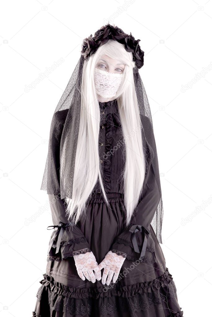 creepy human doll isolated in white