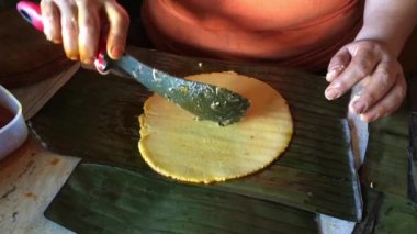 Kadın elleri yeni bir Noel hazırlıyor Venezuela tabak hallakaları
