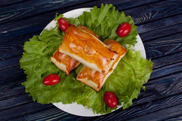 Samsa. Meat dish of the peoples of Central and Central Asia, dough, meat and onions, suitable for the Nauryz or Navruz holidays, as well as during the Holy month of Ramazan and the holidays of Uraz A