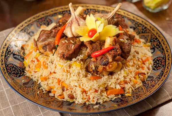 Pilaf. Meat dish of the peoples of Central and Central Asia, rice, meat and onions, suitable for the Nauryz or Navruz holidays, as well as during the Holy month of Ramadan and the holidays of Uraz Ait