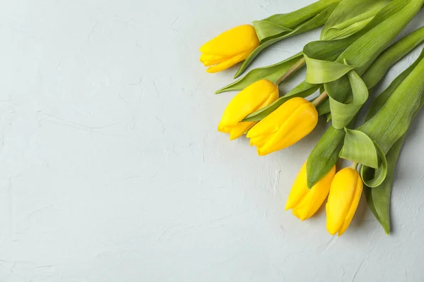 Beautiful Fresh Yellow Tulips Gray Background Top View Space Text — Stock Photo, Image