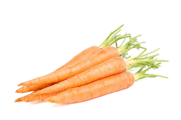 Ripe fresh carrots isolated on white background