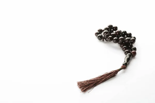 Prayer beads on white background, space for text — Stock Photo, Image