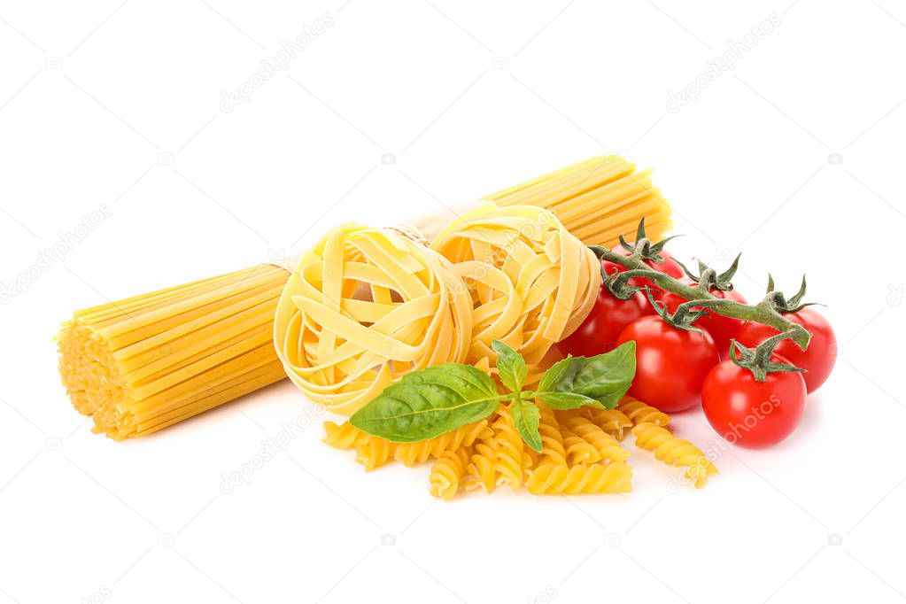 Pasta and vegetables isolated on white background. Uncooked whol