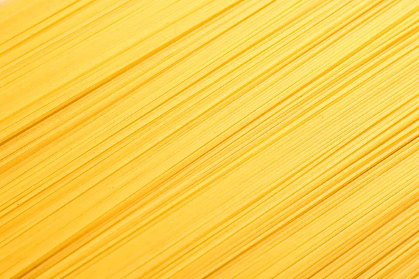 Pasta come sfondo, spazio per testo e primo piano. Interi non cotti — Foto Stock