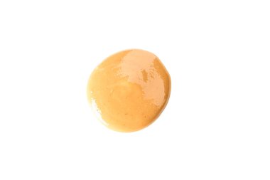 Krem fıstık ezmesi beyaz arka planda izole, üst görünüm. Bir t