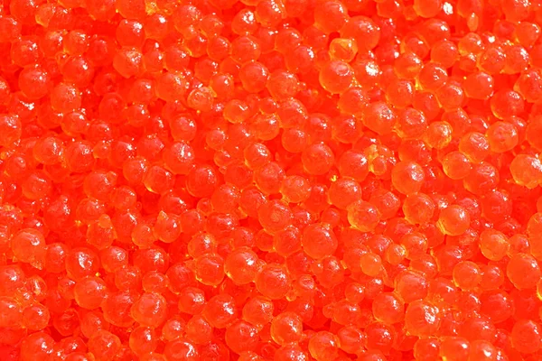 Delicious red caviar as background, close up — Stock Photo, Image